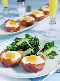 Eggs Baked in Prosciutto di San Daniele Cups and Kale Salad with Grana Padano and Citrus Dressing