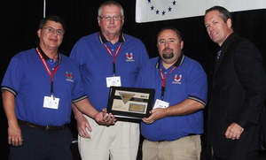 Pictured from left to right are Saia Line Driver Tom Bathe, Saia City Driver 'Bo' Johnny Dorcy, and Saia Regional Safety Manager Chris Wright. They accepted Saia's two first place awards from the American Trucking Associations' Safety Management Council representative on behalf of the company's 8,200 employees at a luncheon held September 13.