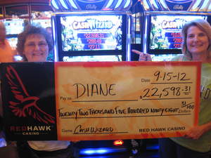 Diane from Valley Springs, Calif., celebrates a $22,598 penny slot win with her friend at Red Hawk Casino.