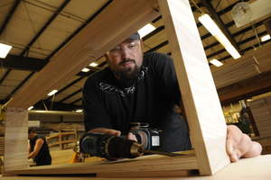 American woodworker hand crafting world class furniture utilizing the strength and performance of imported hardwood plywood for interior strength, fastened to domestic solid maple panels for a superior finish detail.

(C) LouJones 2012
