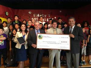 The Barona Band of Mission Indians presented the students and faculty of Myrtle Finney Elementary School with a $5,000 education grant Monday, October 15. From left: Myrtle Finney Principal Olivia Amador-Valerio; Barona Band of Mission Indians Chairman Edwin 'Thorpe' Romero; Chula Vista Elementary School District Superintendent Francisco Escobedo; California State Senator Juan Vargas.