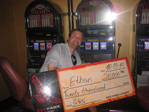Ethan, from Shingle Springs, Calif. celebrates his $20,000 jackpot at Red Hawk Casino.
