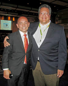 Anthony Melchiorri, left, host and star of Travel Channel's "Hotel Impossible," appears at NATHIC this month in Washington with Mike Cahill, chief executive officer of Hospitality Real Estate Counselors.
