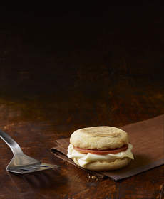 McDonald's is introducing the new Egg White Delight McMuffin nationwide this week. At 250 calories, it is prepared fresh on the grill with 100% egg whites, extra lean Canadian bacon and white cheddar* on a new muffin made with 8 grams of whole grain.
