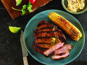 Chipotle-Herb Butter Porterhouse Chop with Corn on the Cob