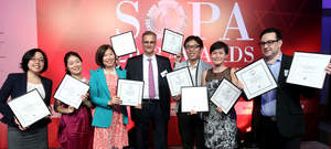 Post prizewinners with managing editor Brian Rhoads (centre) are (from left) Lana Lam, Charlotte So, Denise Tsang, Teddy Ng, Ting Shi and Adolfo Arranz. 
Photo: Edward Wong