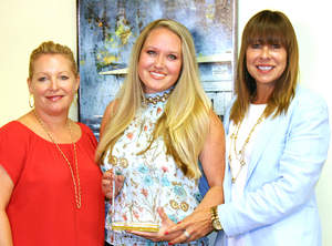 Pictured left to right are Sandy Huseby, CACM 'Rookie of the Year' winner Courtney Chastain, and Margo Crummack