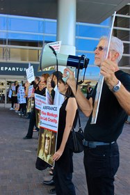 LCA leads chant against Air France's primate shipping policy.