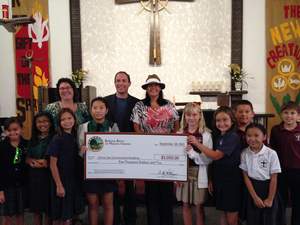 Councilwoman Bonnie LaChappa and Assemblyman Brian Maienschein presenting the grant to the students and Principal Lark Mayeski of Christ the Cornerstone Academy.