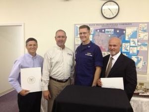 Pictured l-r:  Captain Derek Solar, Captain Michael E. Rooney, USCG Captain P W Gautier, and Captain Maurice "Toby" Wattigney.