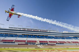 American Red Bull Air Race Pilot Kirby Chambliss "Breaks in" Las Vegas Motor Speedway with Inaugural Flight.   
