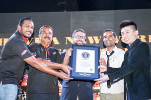 Paktor being presented with a new Guinness World Record(TM)