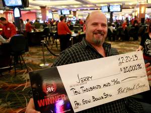 Jerry, from Citrus Heights, Calif., celebrates a $10,000 table games jackpot at Red Hawk Casino.