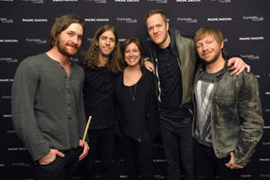 Citi SVP of Entertainment Marketing Jennifer Breithaupt, center, with Imagine Dragons' Daniel Platzman, Wayne Sermon, Dan Reynolds and Ben McKee at Citi Presents an Exclusive Performance by Imagine Dragons for Citi ThankYou Cardmembers, benefiting the Grammy Foundation, on Thursday, Jan. 23, 2014 at the Wiltern Theatre in Los Angeles. (Photo by John Shearer/Invision for Citi/AP Images)