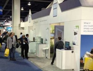 A stunning HomeGrid Forum booth draws the crowds at CES2014