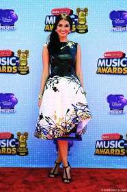 On April 26, Radio Disney on-air personality Maddy of "Morgan & Maddy in the Morning" rocked the Red Carpet at the Radio Disney Music Awards in a glam dress made with Duck Tape(R). Created by Michelle Lesniak, "Project Runway" Season 11 winner, the dress required nearly 40 rolls of tape, including several Duck Tape(R) colors, as well as Duck Glitter(R) and Duck Prism(R) crafting tapes for added shine.