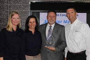 Omron Electronic Components Presents TTI, Inc.'s Todd Zara with Supplier Manager of the Year Award. Left to right: Rachel Miller - Omron Distribution Sales Representative, Kris Whitehouse - Omron Director of Sales Solutions, Todd Zara - TTI, Inc. Director of Supplier Marketing, and Jeff Rogers - Omron President and Chief Operating Officer.