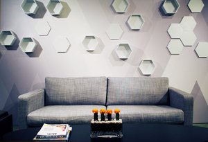 Visual Magnetics' Creative Director Tori Deetz designed and crafted bio-inspired honeycomb wall shelves using the InvisiLock system.
