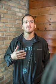 Miguel Danielson, founder of Fargo Startup House, gives a tour of the facility during an open house.