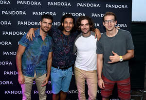 Musicians Mark Pellizzer, Nasri Atweh, Ben Spivak and Alex Tanas of the band "Magic!" attend Pandora Presents on the Santa Monica Pier on August 9, 2014 in Santa Monica, California.  (Photo by Michael Buckner/Getty Images for Pandora)