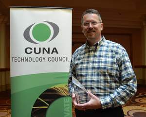 Lee Christiansen, information systems manager for Mountain America Credit Union, accepting the CUNA Excellence Award for Technology Infrastructure