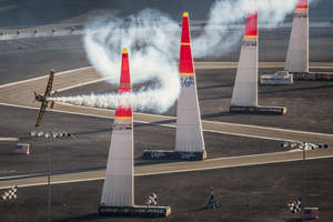 Nigel Lamb of Great Britain performs and takes the second place on the qualifying for the seventh stage of the Red Bull Air Race World Championship at the Las Vegas Motor Speedway in Las Vegas, Nevada, United States on October 11, 2014.