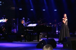 Carly Paoli performs at 2014 David Foster Foundation Gala, accompanied on piano by David Foster