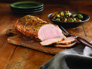 Pork Roast with Bacon, Brussels Sprouts and Pomegranate