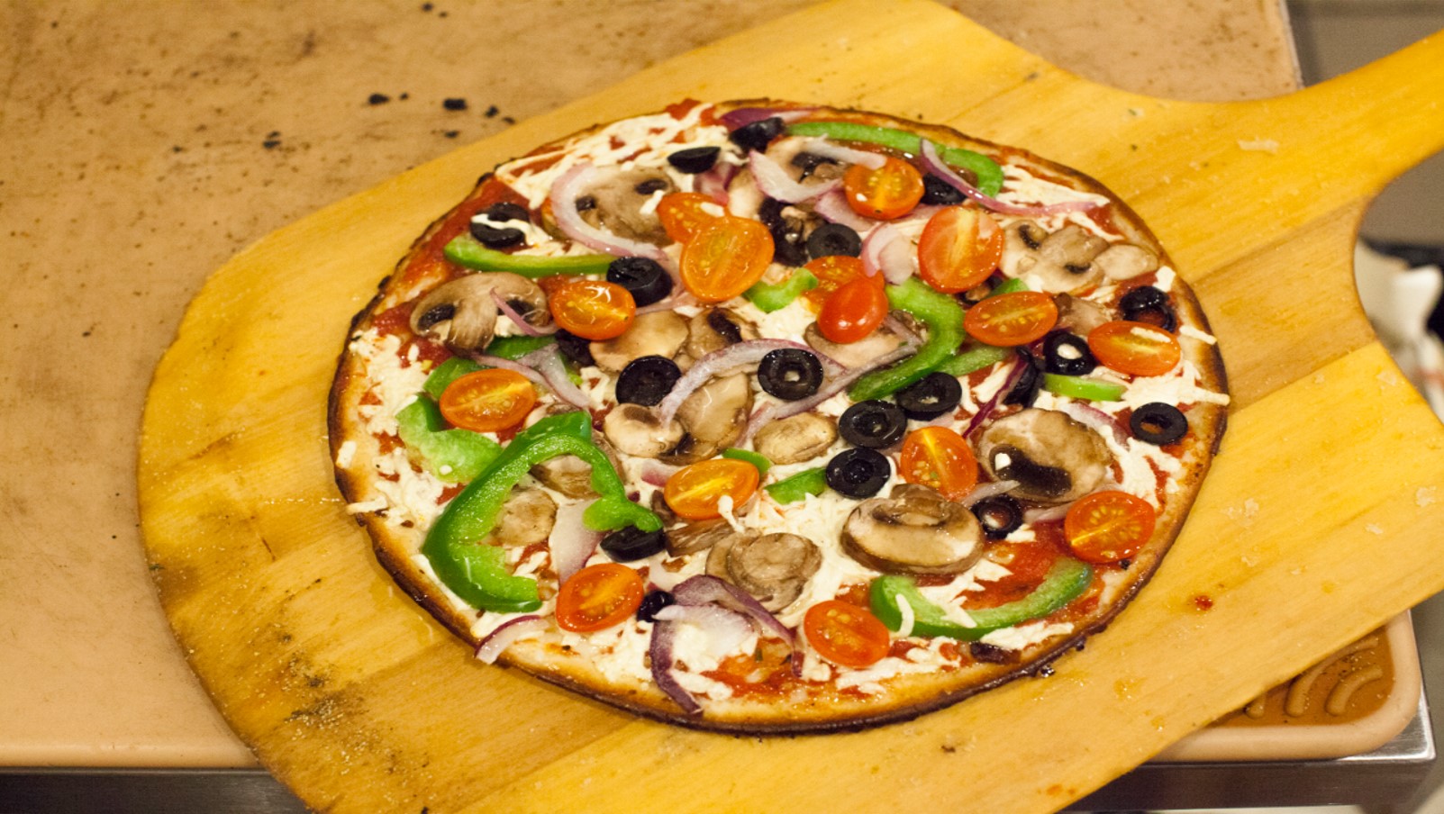 Pieology Pizzeria Adds Vegan Mozzarella Cheese to the Menu