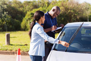 Car inspection check list with man and woman