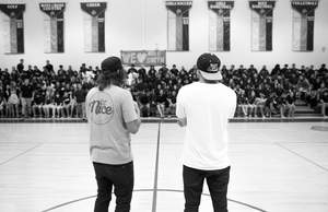J.R. Galardi and Mike Smith address hundreds of high school students at an assembly during the Hot Dogs for the Homeless Tour