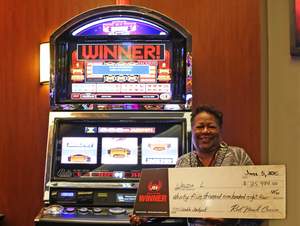 Wanda, from Sacramento, Calif., takes home a $35,984 slot jackpot from Red Hawk Casino.