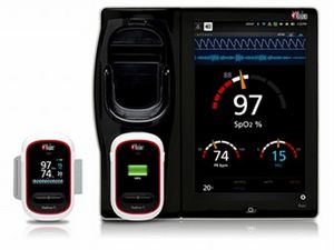 Masimo Root® patient monitoring and connectivity hub with the Radius-7™ patient-worn, wireless monitor.