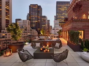 The Quin hotel's new Penthouse Suite terrace at dusk