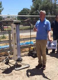 Ionex CEO Phil Chandler shows the IXP system to officials from the State Water Resources Control Board and the California Partnership for the San Joaquin Valley