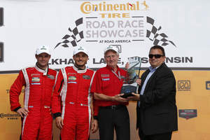 DEKRA congratulates #62 Risi Competizione’s Ferrari F458 Italia, winner of the DEKRA Green Challenge Award at the Continental Tire Road Race Showcase held at Elkhart Lake, Wisconsin on August 9, 2015.  Pictured (left to right), are Drivers Pierre Kaffer and Giancarlo Fisichella, Team Manager Dave Sims, and Donald O. Nicholson, CEO and President of DEKRA North America.