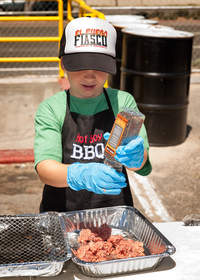 Pint-sized BBQ competitor William Baker from the “Hot Boy BBQ” team placed 2nd in the 6-10 age group.