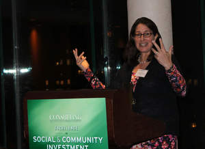 The Boston Consulting Group's Wendy Woods accepts the Consulting magazine Social and Community Investment Award for the firm’s pro bono work with the United Nations.