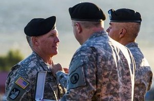 Col. Brad C. Fuller, new director of operations at Antis Roofing and Waterproofing, receives the The Legion of Merit award after relinquishing command during a change of command ceremony for the Utah Army National Guard.