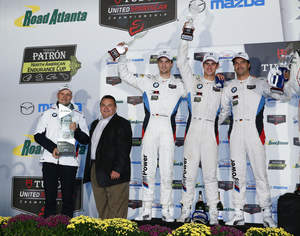 DEKRA congratulates #24 BMW Team RLL’s BMW Z4 GTE as the winner, for the third time, of the DEKRA Green Challenge Award at Petit Le Mans at Road Atlanta race held in Braselton, GA, October 3, 2015. Pictured (left to right) are Jens Marquardt, BMW Motorsport Director, Donald O. Nicholson, CEO and President of DEKRA NA, and BMW Drivers Jens Klingmann, John Edwards, and Lucas Luhr.