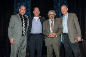 Comport CEO and President, Jack Margossian (center right) and Executive Vice President, Mike Vencel (center left) accepting the award alongside Arrow executives.