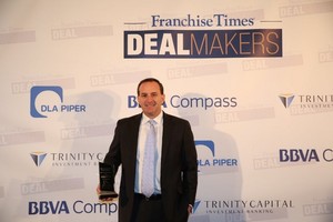 Steve Brake, Del Taco CFO and EVP, accepts Deal of the Year Award at Franchise Times Finance & Growth Conference