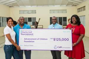 Representatives from hand over check to the ACF. From left to right Naeemah Hazelle - ACF Board Chairperson, Kevin Edwards, Marketing and Corporate Communications Manager, David Lake CWC Country Manager and Krystal Gardener - ACF Board Member