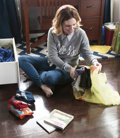 Woman packing clothes