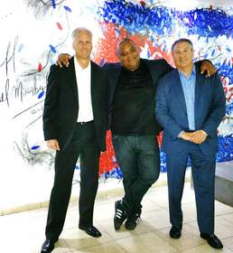 From left to right: Dave Seleski, Stonegate Bank CEO, Michel Mirabal, Artist, Jeff Nudelman, Stonegate Bank Director