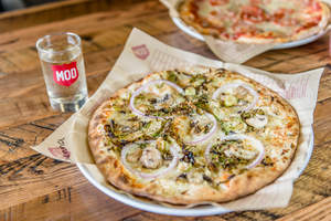 MOD Pizza "sprouts" a new summertime offering, the Sienna. The pizza features roasted Brussels sprouts, a delectable garlic rub, red onions, sliced mushrooms, a hint of rosemary, mozzarella and grated Parmesan cheeses and is available through September 30.