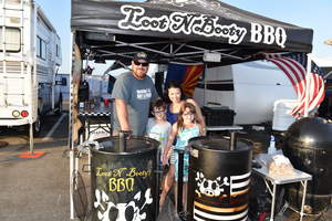 BBQ grand champion Loot N' Booty BBQ, from Scottsdale, Ariz. led by pit master, Sterling Smith. Photo Credit: Kenny Goldberg Photography
