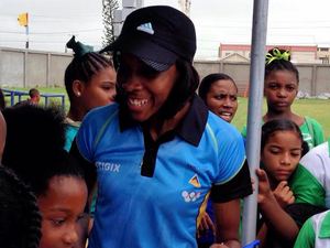 Olympian Levern Spencer with children at the 759 Champions Tour in St. Lucia