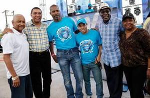 Prime Minister of Jamaica, The Most Honorable Andrew Holness (2nd left) is flanked by (from L-R) Errol Miller, Executive Chairman of the FLOW Foundation; Garry Sinclair, Managing Director, FLOW Jamaica; Carlo Redwood, VP Marketing & TV; the Hon. Senator Ruel Reid, Minister of Education, Youth and Information and the  Hon. Olivia Grange, Minister of Culture, Gender, Entertainment & Sport.