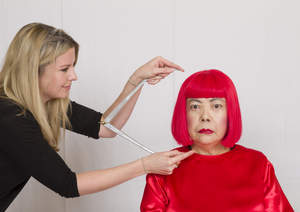 The Madame Tussauds production team takes measurements for Yayoi Kusama